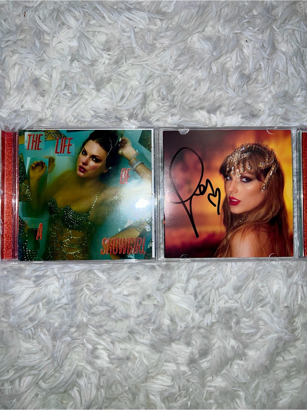 Autographed Taylor Swift CD with heart- life of a show girl